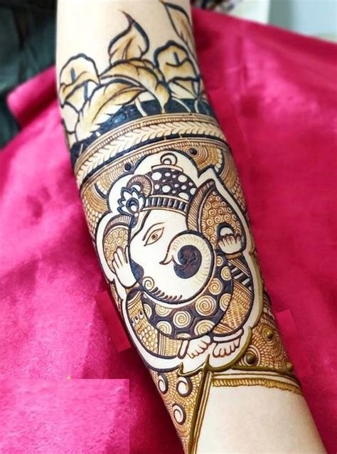 2_10 Adorable Ganesh Mehndi Designs for Festivals 2023