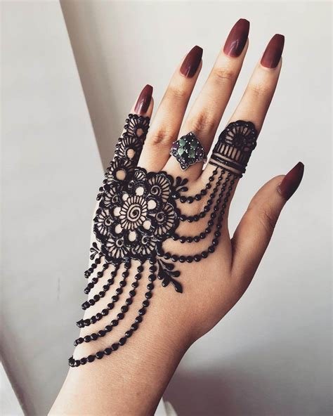 9_40 Trendy Back Hand Mehndi Designs for Modern Brides