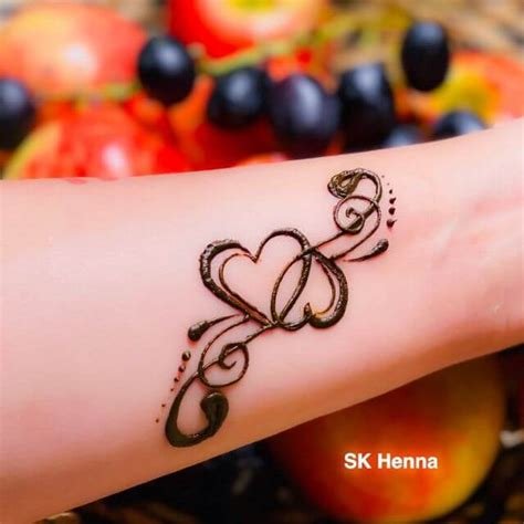 3_A Name Mehndi Tattoo  Mehndi tattoos are decorative designs in the