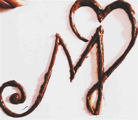 6_Letter M with Mehndi flower decorative ornament in ethnic oriental