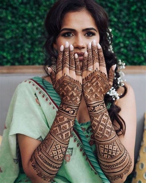 10_40 Trendy Back Hand Mehndi Designs for Modern Brides