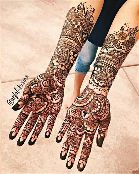 10_Photo of Beautiful inticate bridal mehndi design for full hands