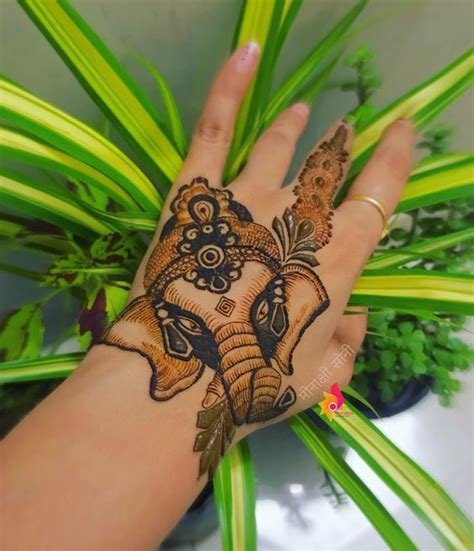 4_10 Adorable Ganesh Mehndi Designs for Festivals 2023