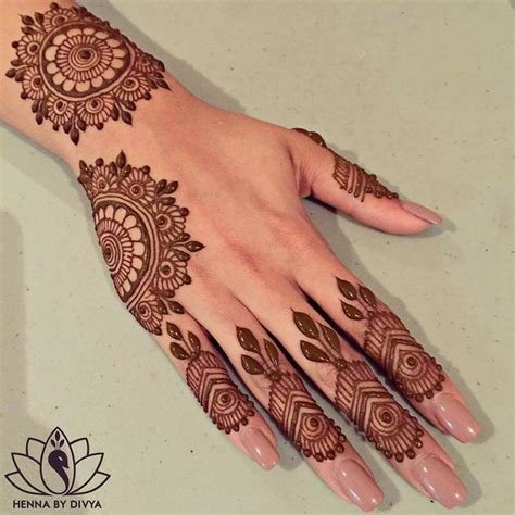 15_9 Beautiful and Simple Back Hand Mehndi Designs That Are Guaranteed to