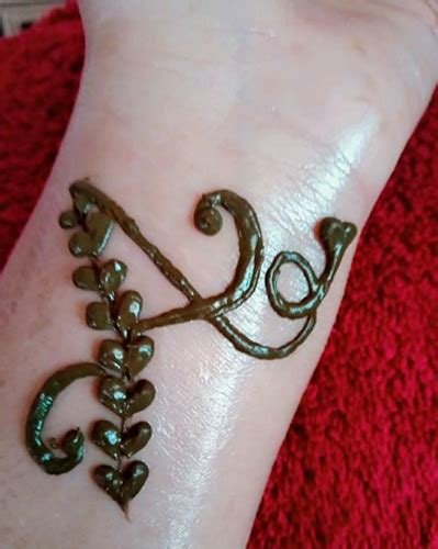 12_A Hidden Name  Marvelous Mehndi 30 Beautiful Bridal Henna Designs