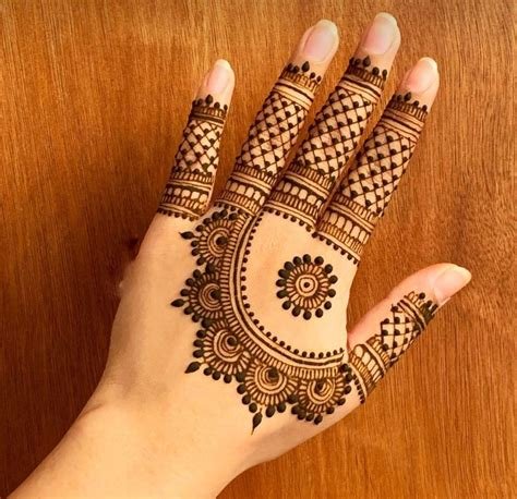 15_9 Beautiful and Simple Back Hand Mehndi Designs That Are Guaranteed to