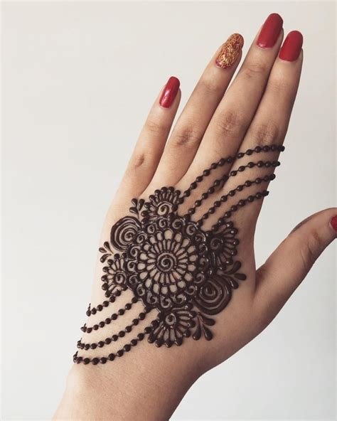 10_Unique Back Hand Mehndi Designs For The Bridesmaids  WedMeGood