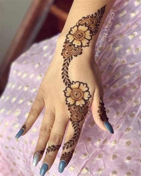 10_30 Stylish and Modern Arabic Mehndi Designs to inspire you  Wedandbeyond