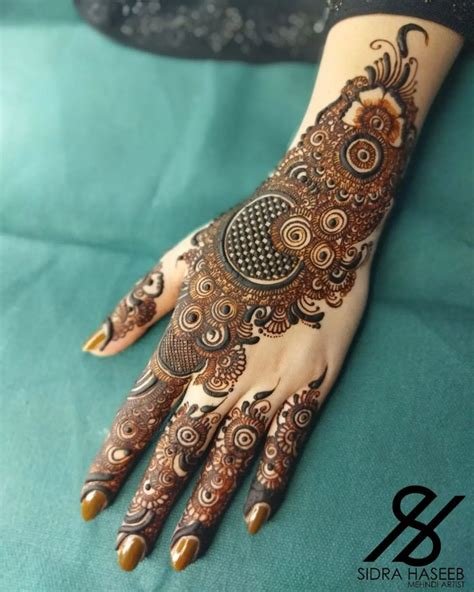 4_70 Gorgeous Back Hand Mehndi Designs That Stole Our Hearts  Pyaari