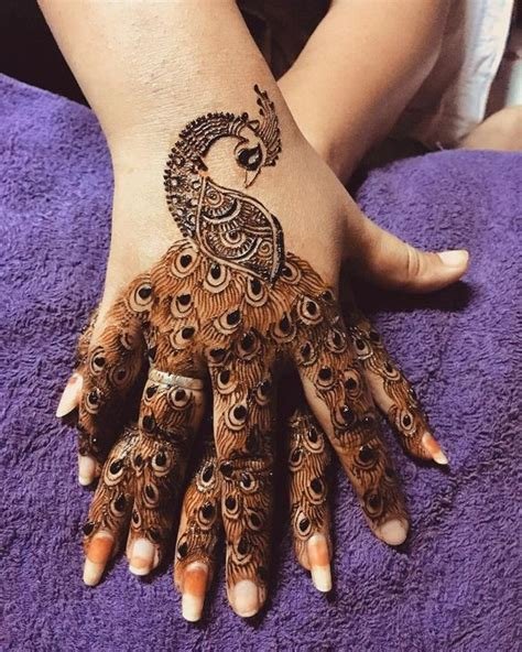 11_29 Remarkable Peacock Mehndi Designs for the Brides of Today