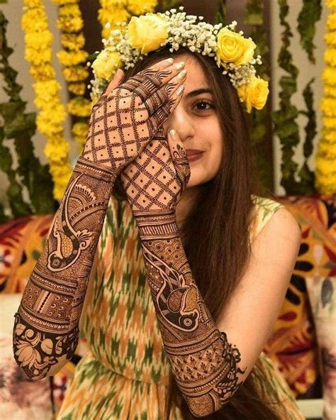 10_45 Remarkable Peacock Mehndi Designs for the Brides of Today