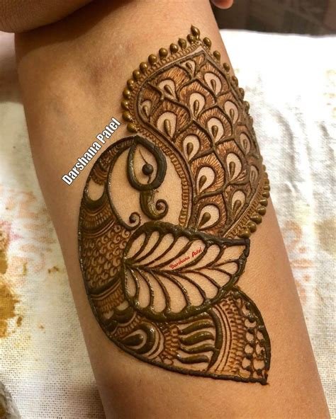 12_45 Remarkable Peacock Mehndi Designs for the Brides of Today