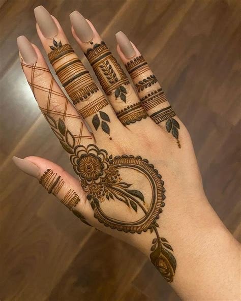 8_9 Beautiful and Simple Back Hand Mehndi Designs That Are Guaranteed to