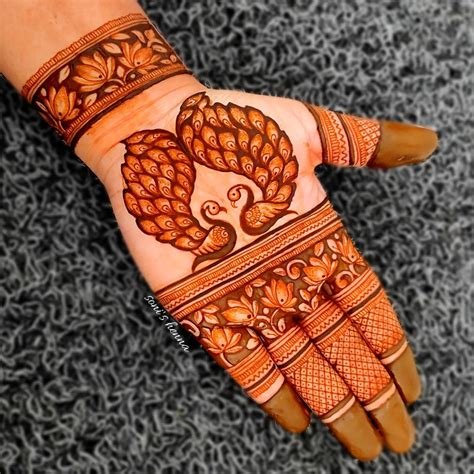 9_29 Remarkable Peacock Mehndi Designs for the Brides of Today